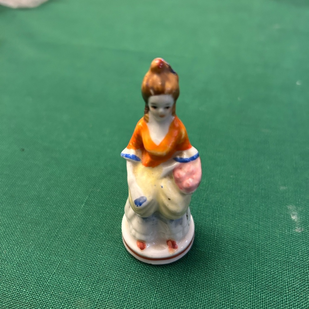 Occupied Japan, girl with basket figurine